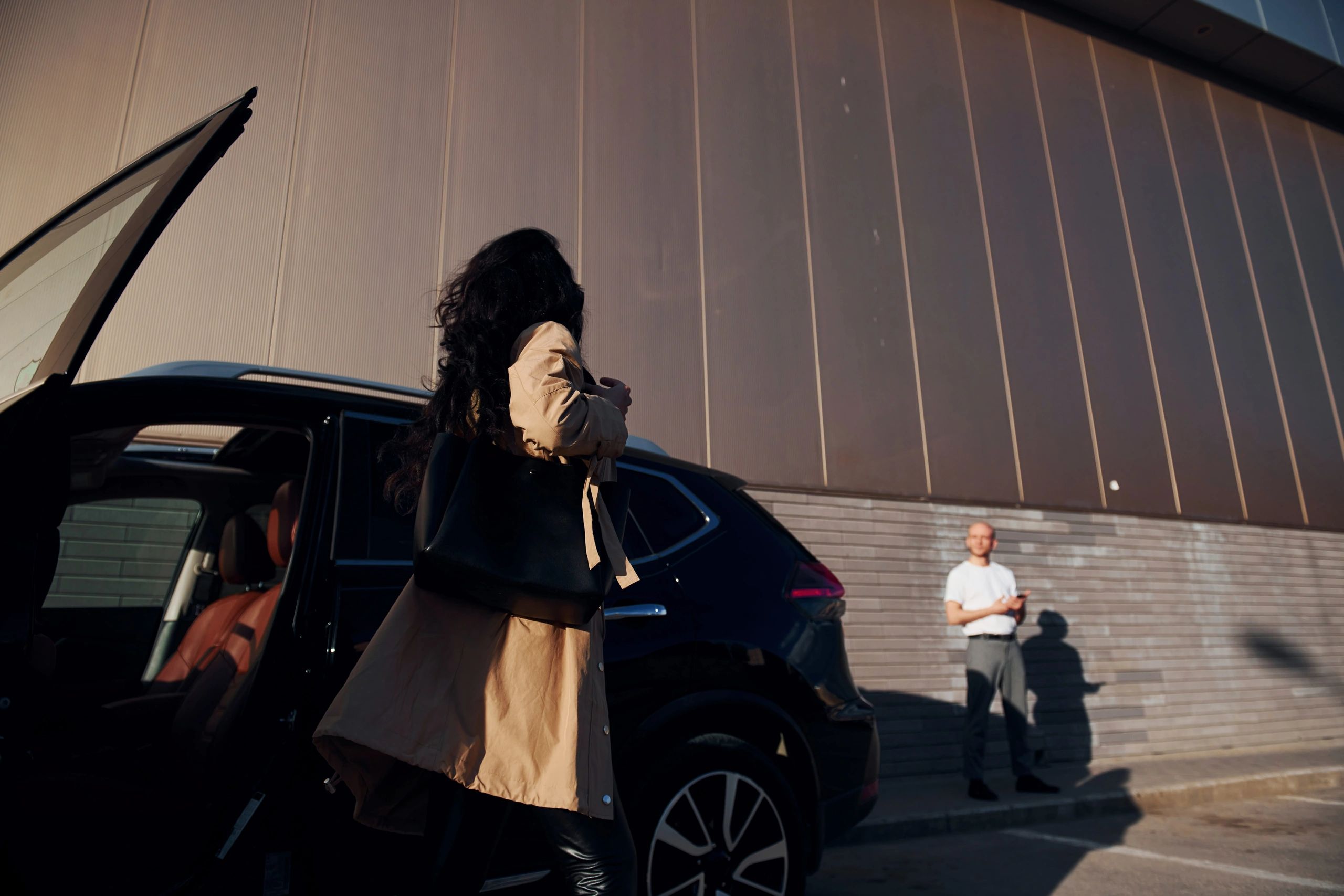 Commuter getting out of a car for an everyday trip